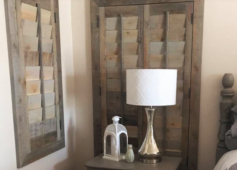 Atlanta bedroom with reclaimed wood shutters.